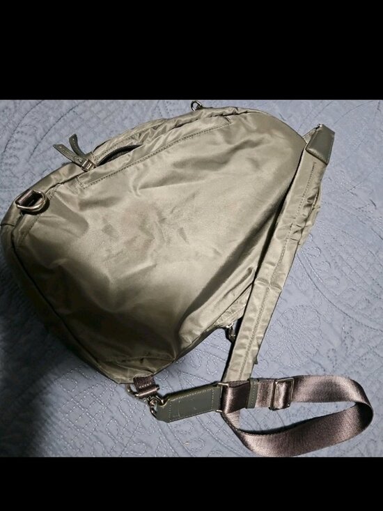 Tumi sling backback purse tote